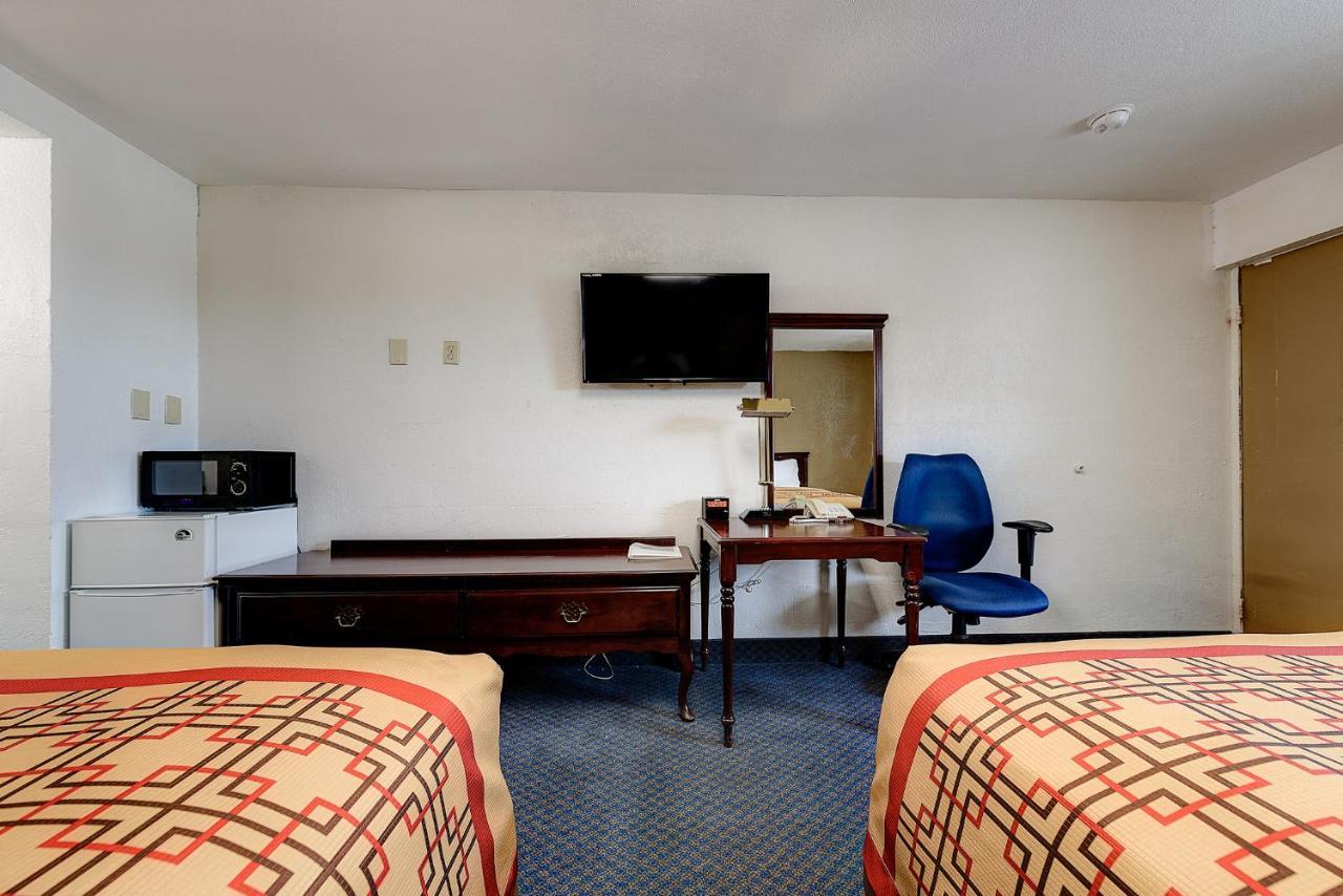 Guest Inn โรเจอร์ส ภายนอก รูปภาพ