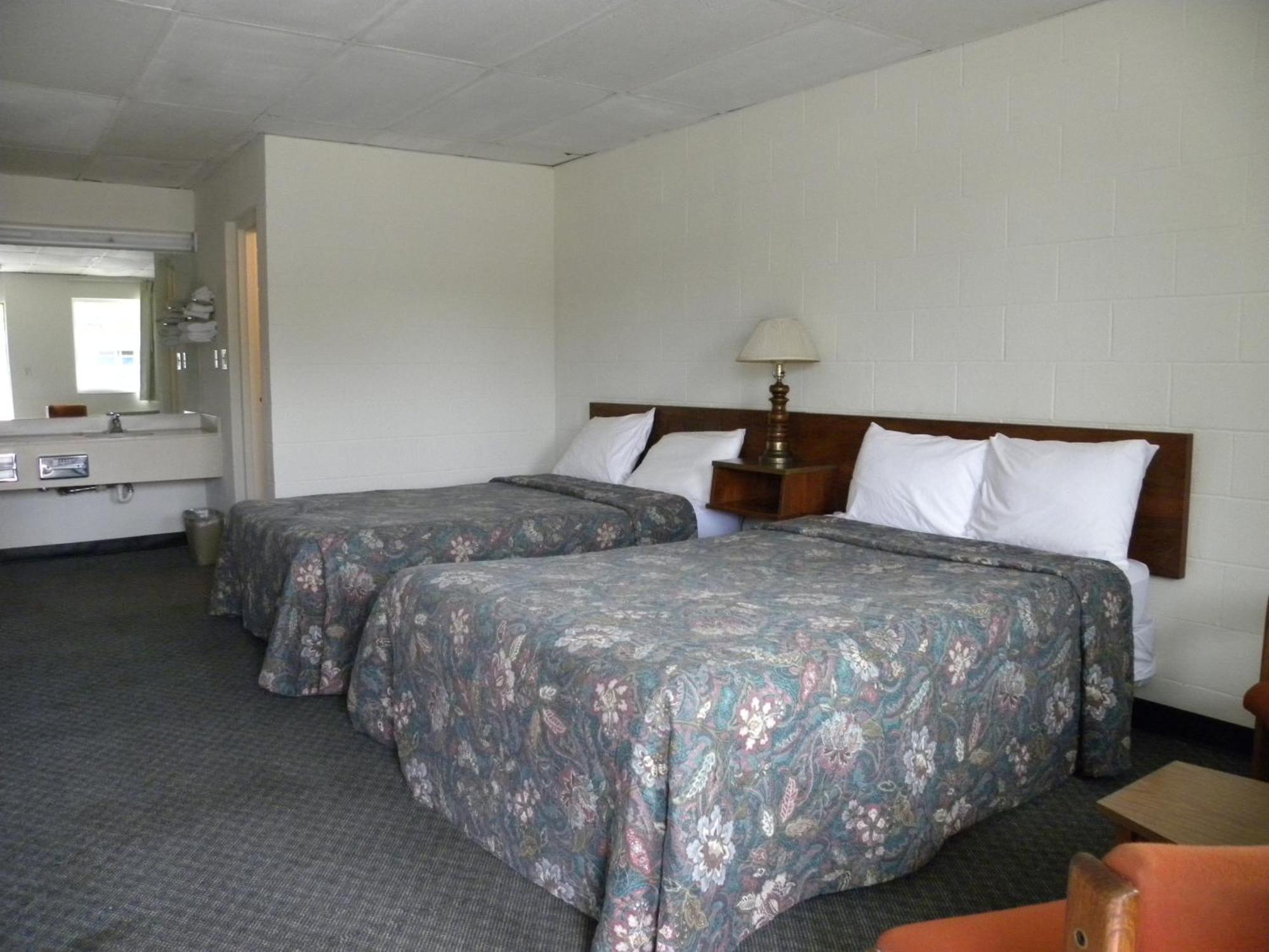 Guest Inn โรเจอร์ส ภายนอก รูปภาพ