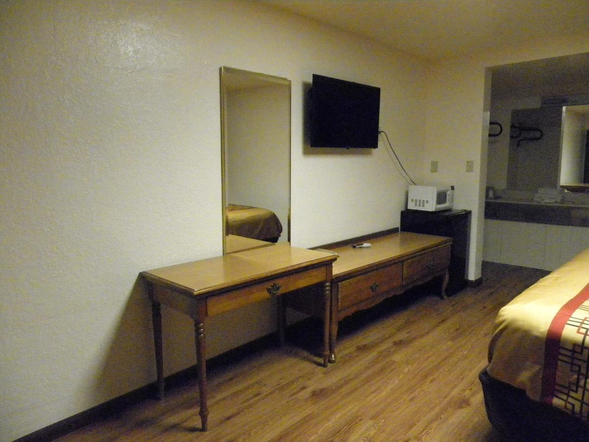 Guest Inn โรเจอร์ส ภายนอก รูปภาพ