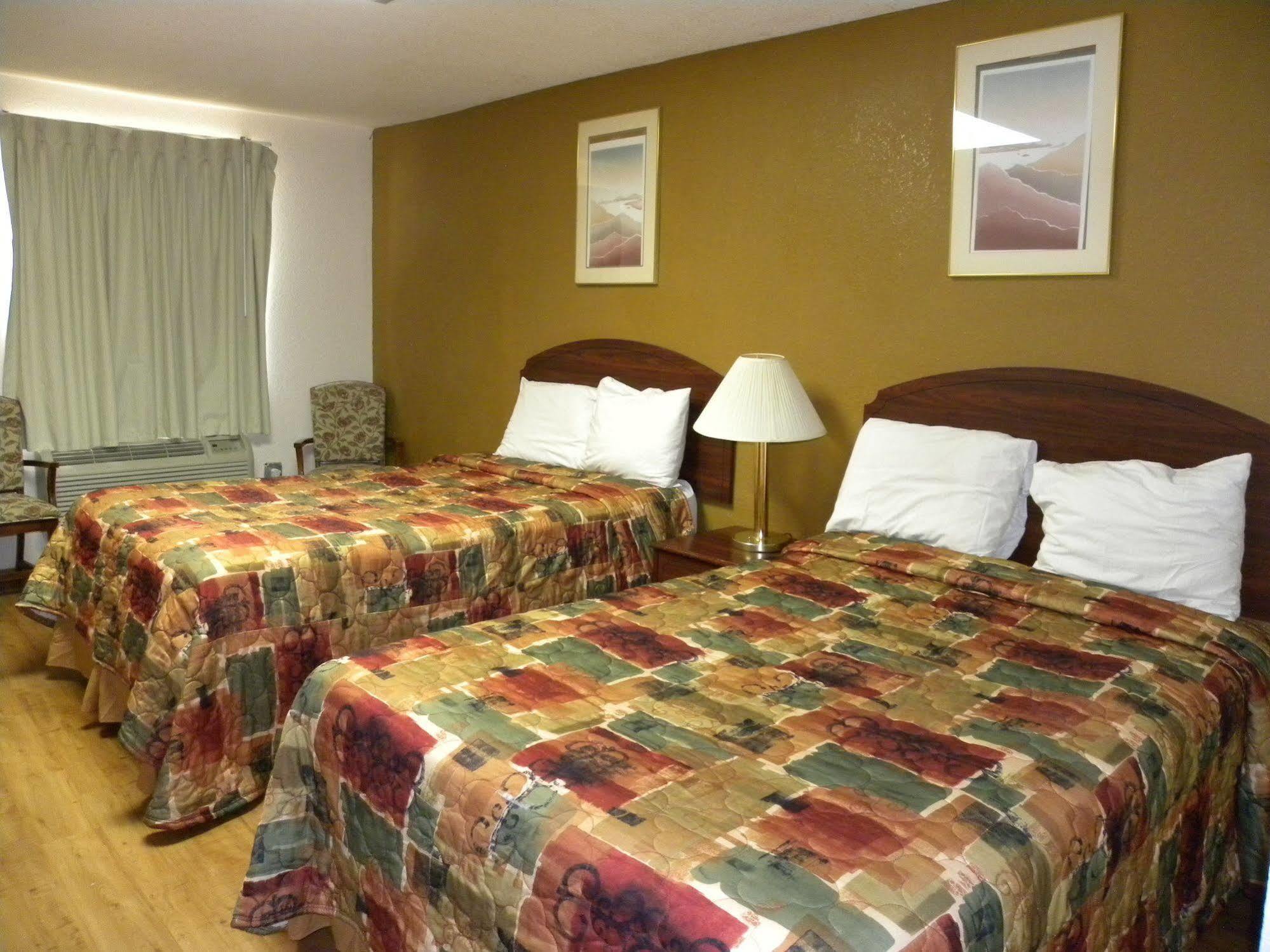 Guest Inn โรเจอร์ส ภายนอก รูปภาพ