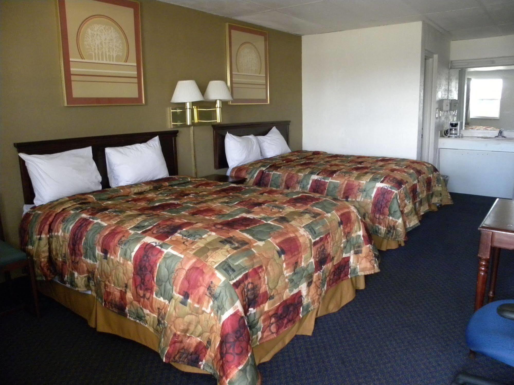 Guest Inn โรเจอร์ส ภายนอก รูปภาพ