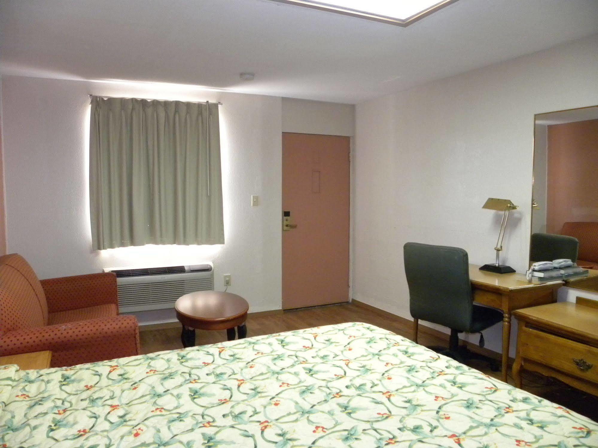 Guest Inn โรเจอร์ส ภายนอก รูปภาพ