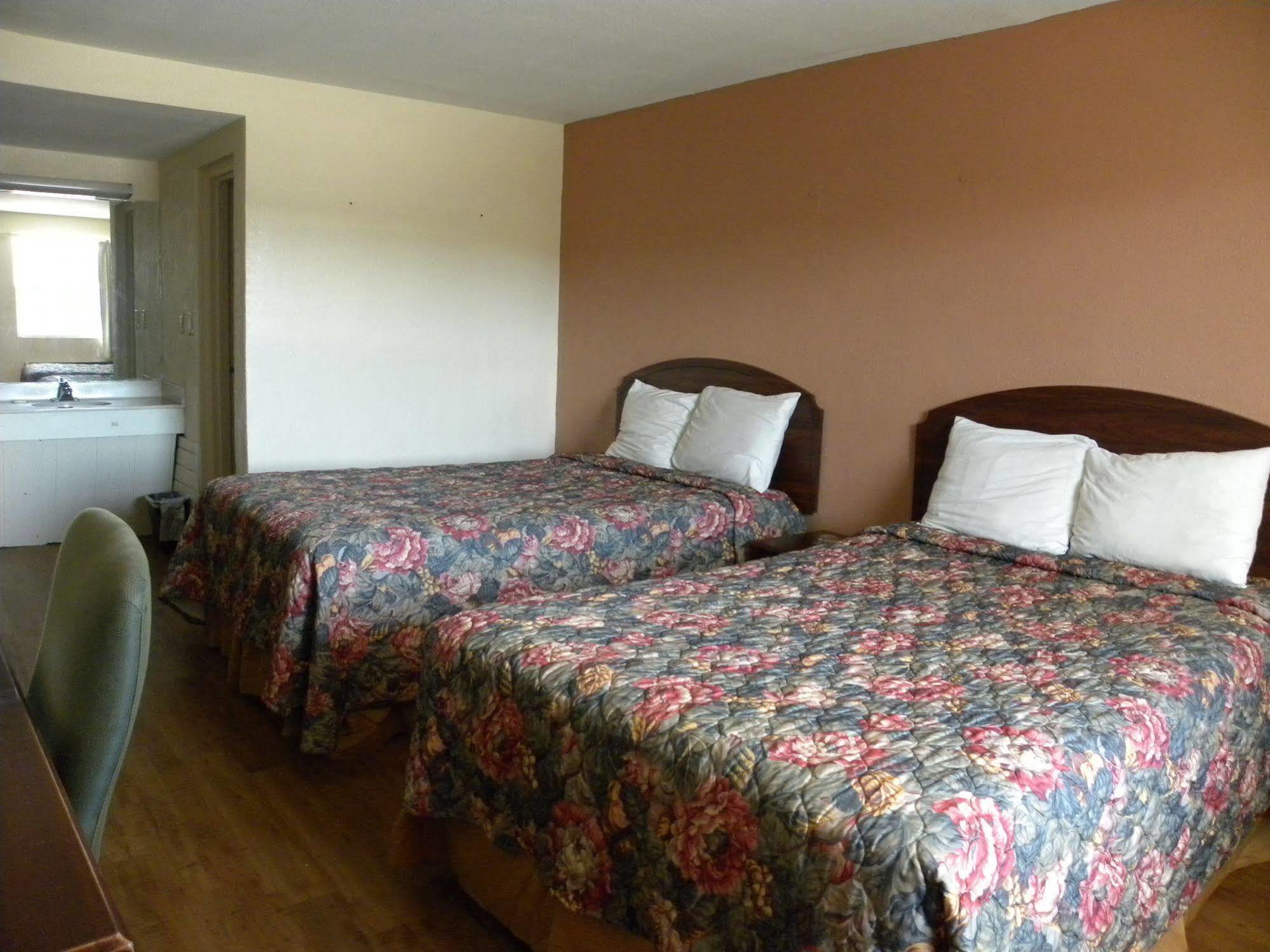 Guest Inn โรเจอร์ส ภายนอก รูปภาพ